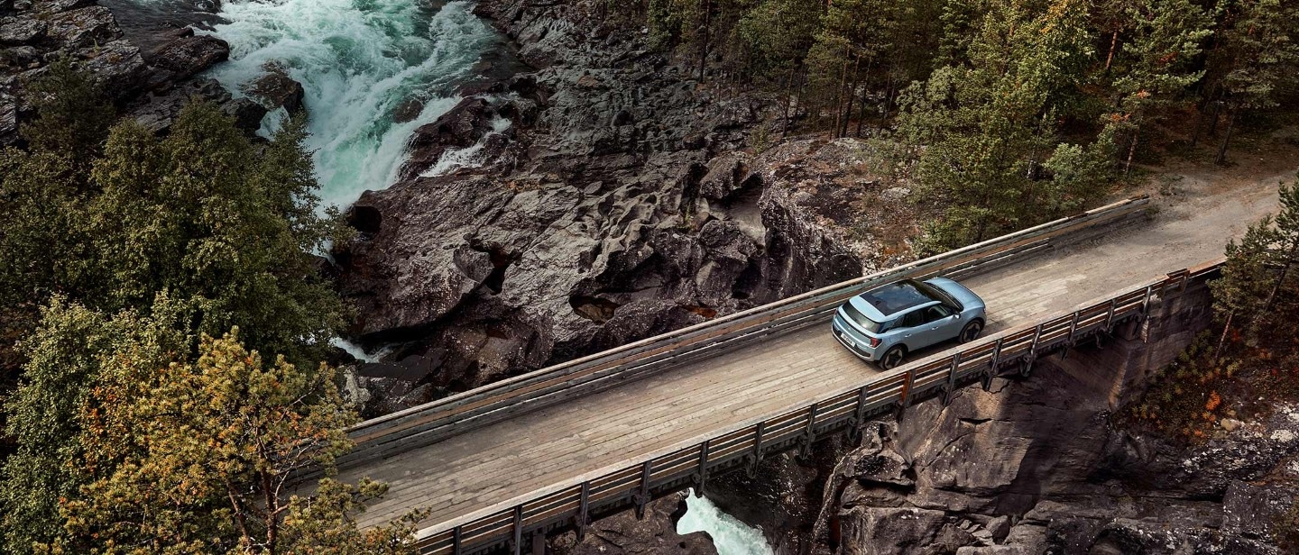 All-New Electric Explorer driven on bridge in wilds