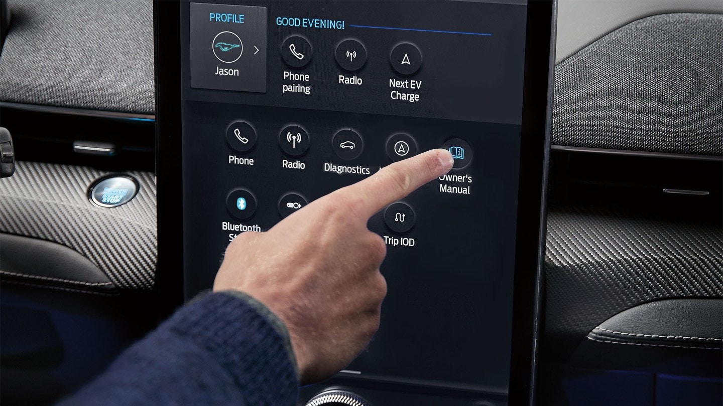 Person using manual control on the ford central display console
