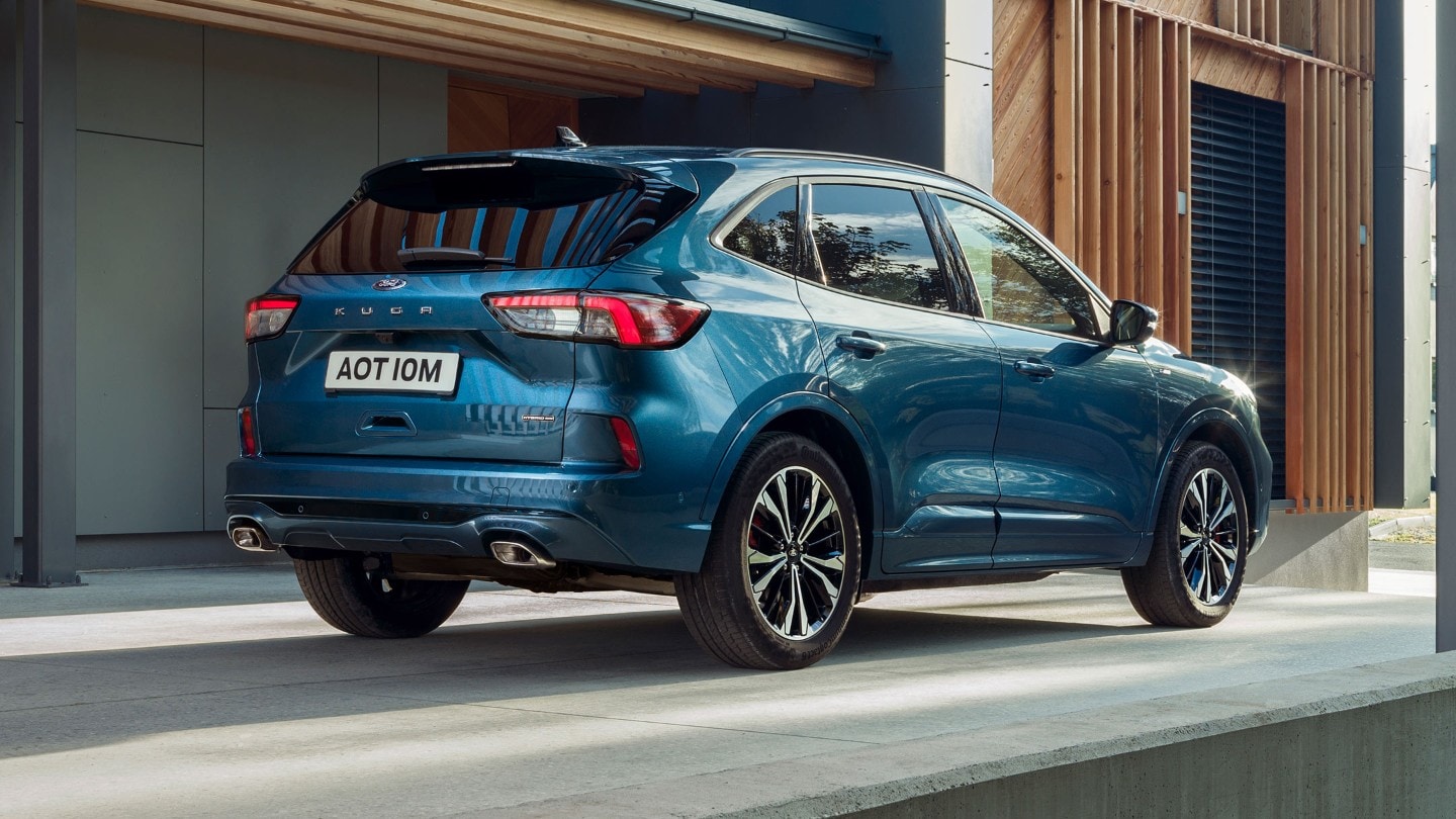 Blue Ford Kuga Hybrid ST-Line X parked from the rear