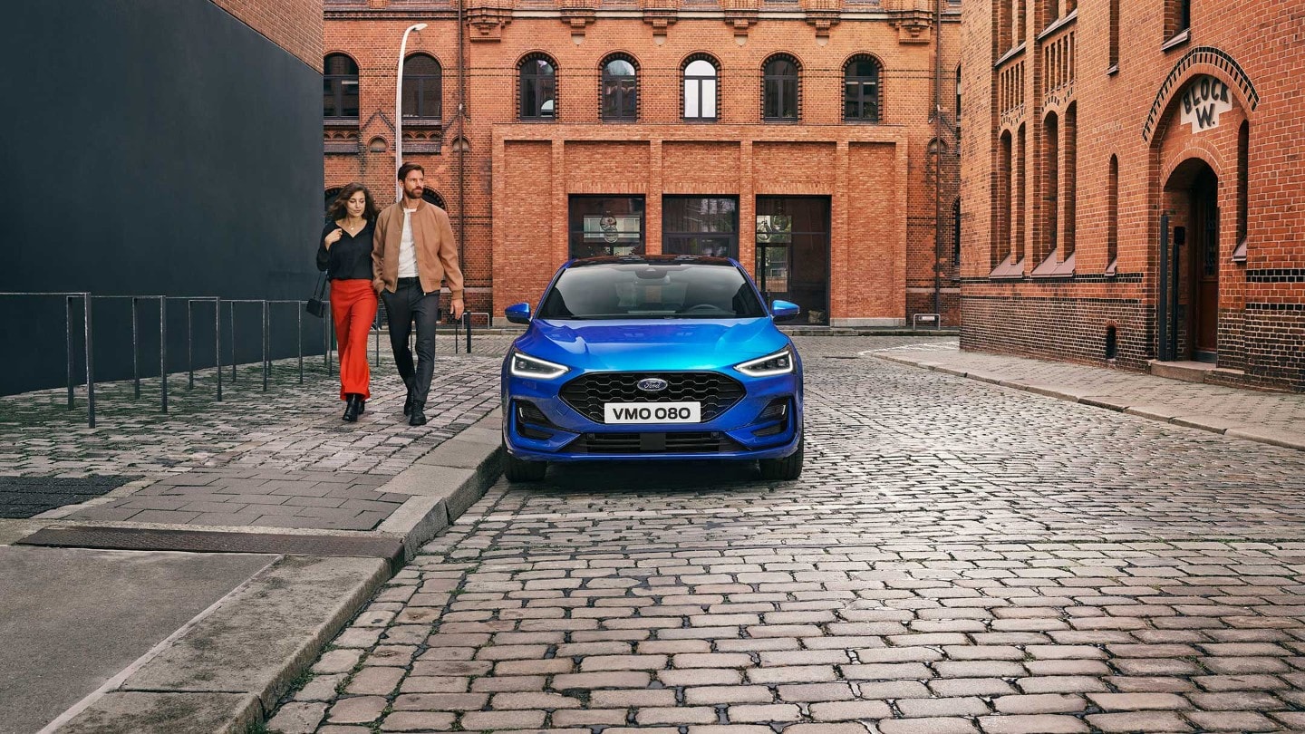 Honeycomb front grille on a blue Ford Focus