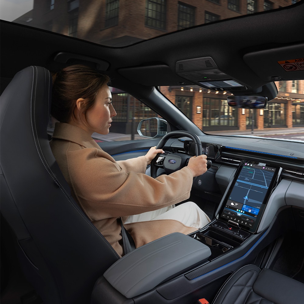 A view of a person driving Ford Explorer®