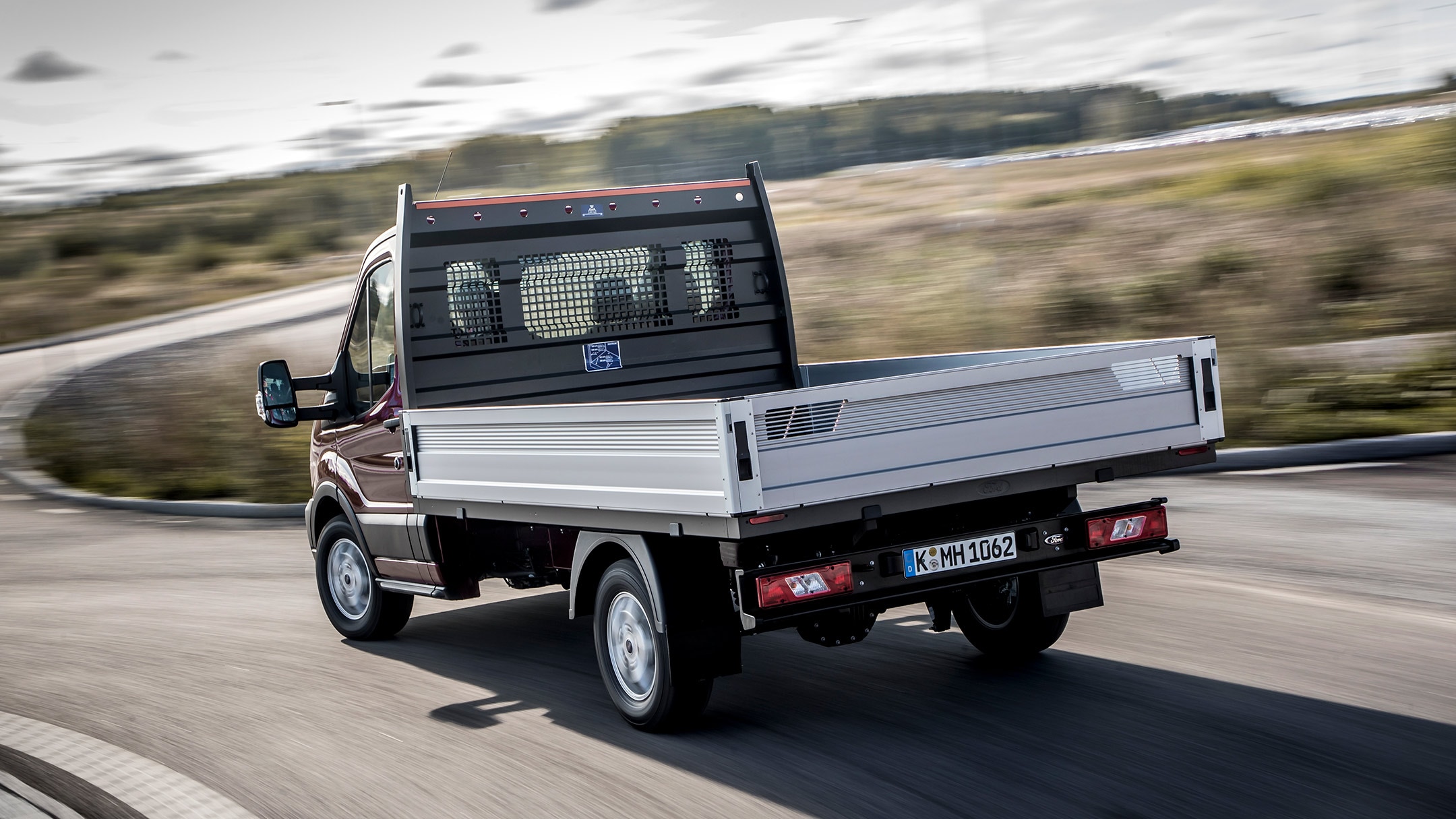 Ford Transit Chassis Cab rear view on road bend