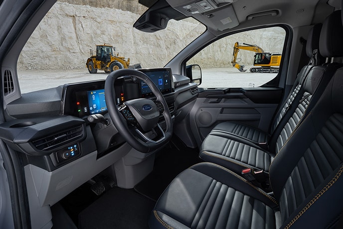 The interior of an electric Ford E-Transit Custom van.